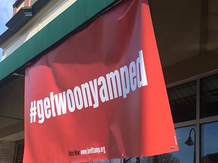 Banner of a community building hashtag #GetWoonyRamped