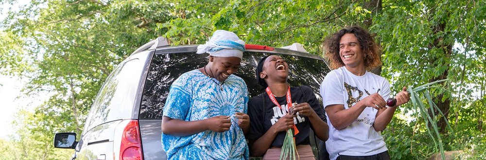 Farmers laugh during a short break.