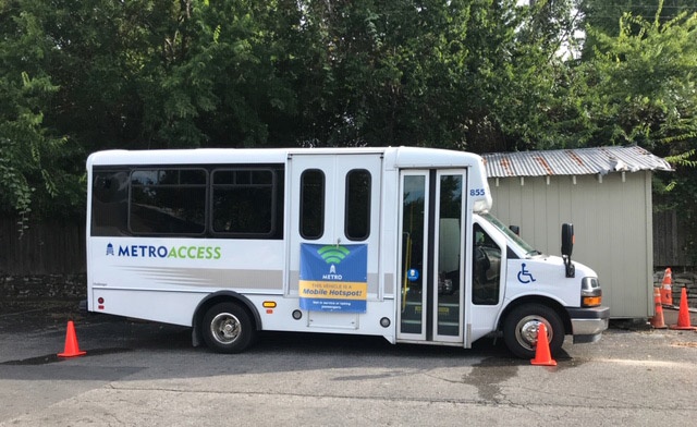 A bus provides WiFi in a community where not everyone has internet access.