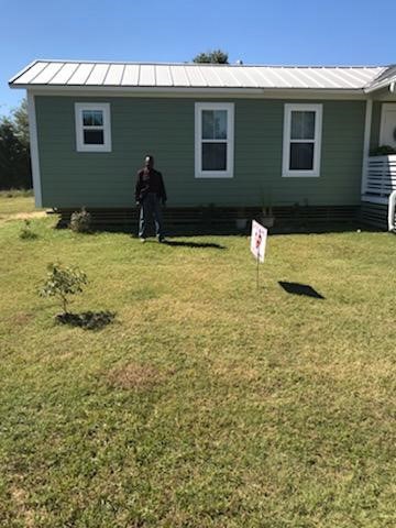 Johnny near his home.