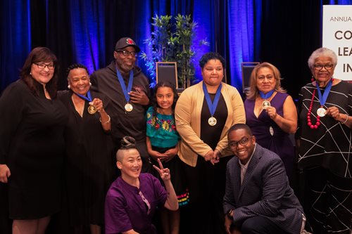 Group Photo of Awardees, President & CEO Marietta Rodriguez, and event hosts