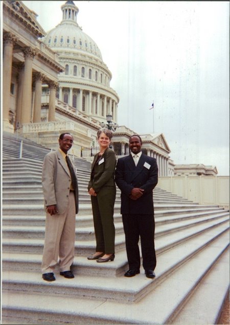 Sue Reynolds receiving an award in front of the U.S. Capitol.