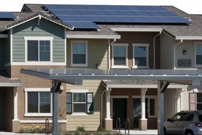 The Spring Lake Property at Mutual Housing shows solar panels.