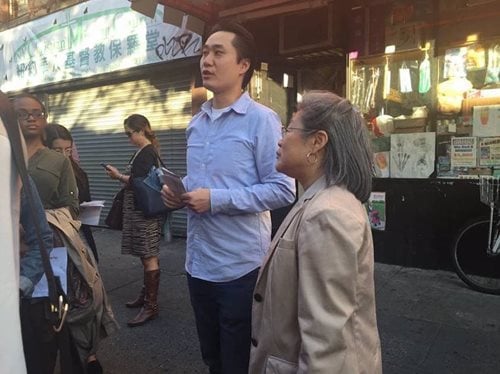 Thomas Yu with Board President Lydia Tom during a walk through Chinatown to discuss needs for affordable housing.