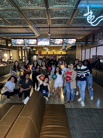 Interns bond with bowling at the beginning of the summer.