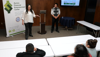 Staff introduce the Aurora Financial Empowerment Center.