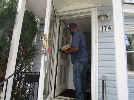 CDCLI helps weatherize a homeowner's doors