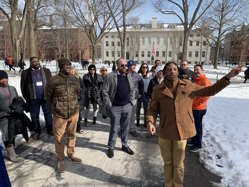 The class of Achieving Excellence participants meets at Harvard.