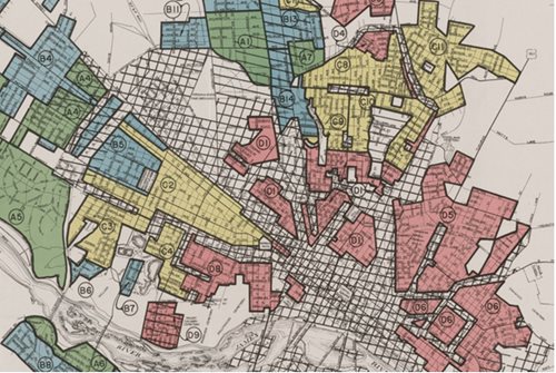 A map shows an example of historical redlining.