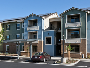 A row of three-level apartments