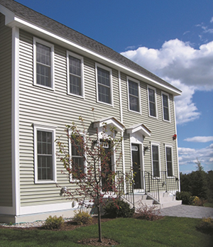 A two-story affordable housing building in New Hampshire